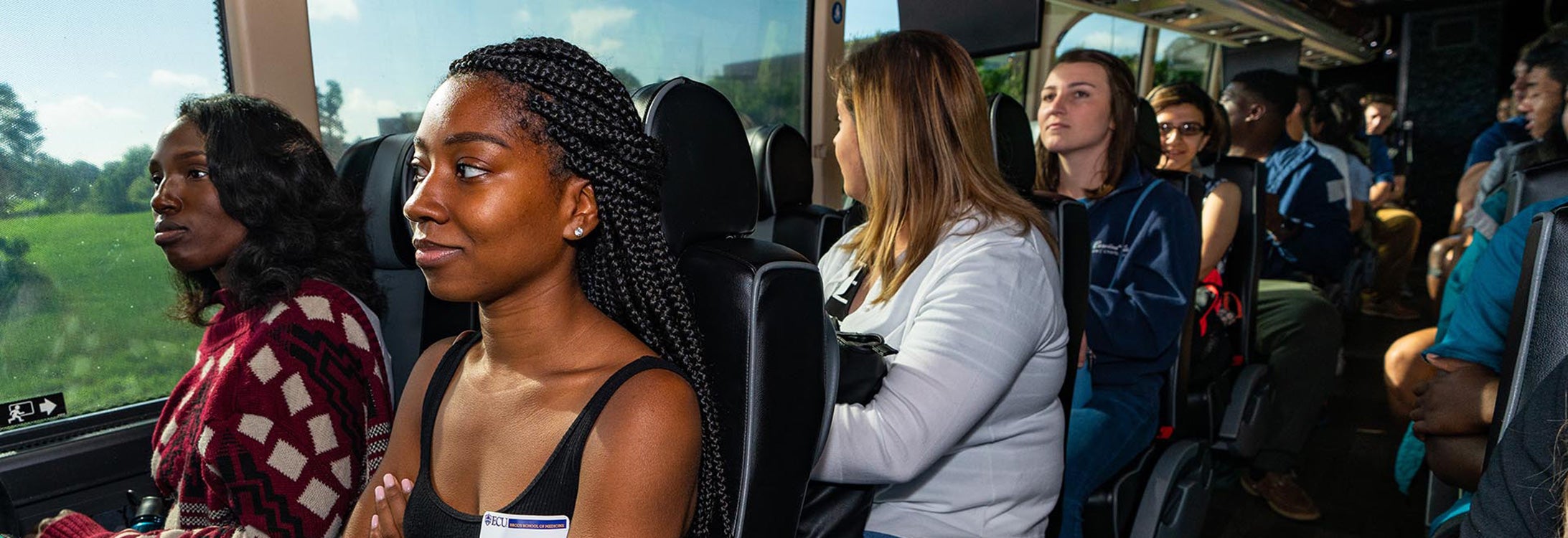 Female students on a bus